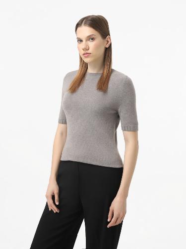 T-shirt is knitted Color: Dark ivory