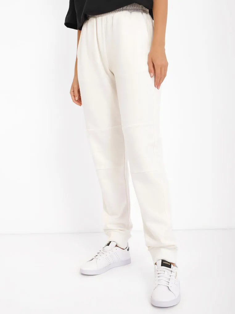 Штани на манжетах