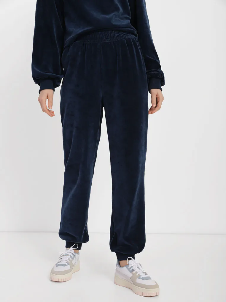 Elastic band pants in velour