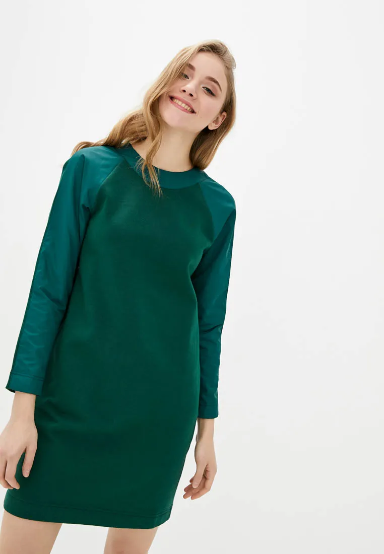 Dress with decorative inserts