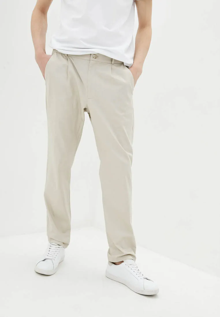 Брюки чінос