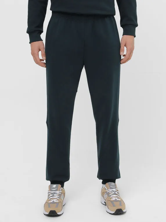 Штани на манжетах